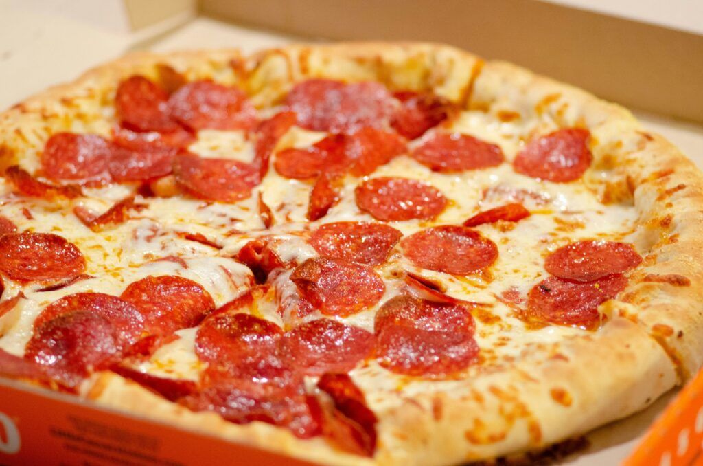 Pepperoni pizza in a box.