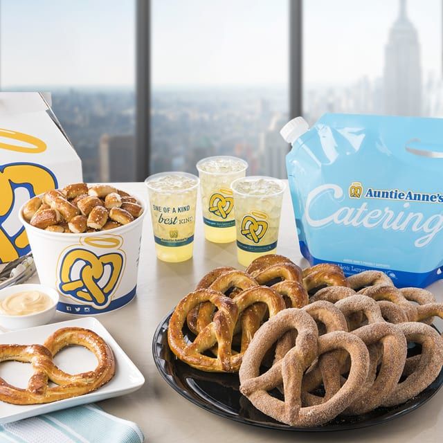 If you don't have hours to plan a celebration of snacks for your office, try Auntie Anne’s convenient catering packages of pretzel-wrapped hot dogs and sweet treats.  