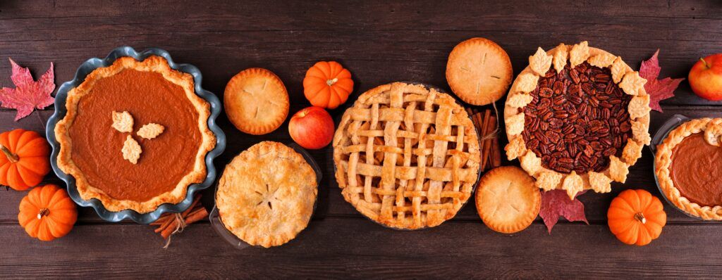 array of pumpkin, apple, and pecan pie