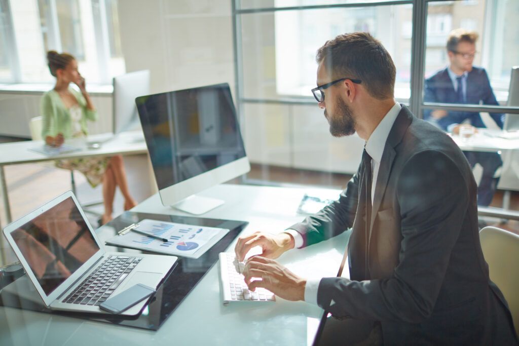 working in the office at a desk