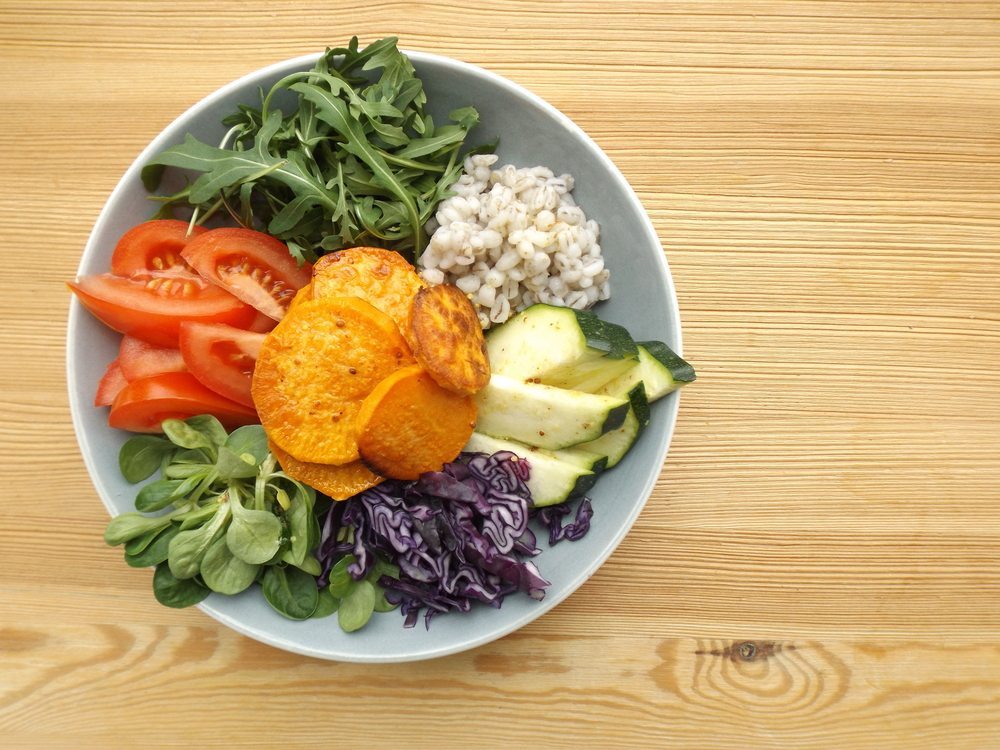 Buddha bowl with fresh vegetable toppings